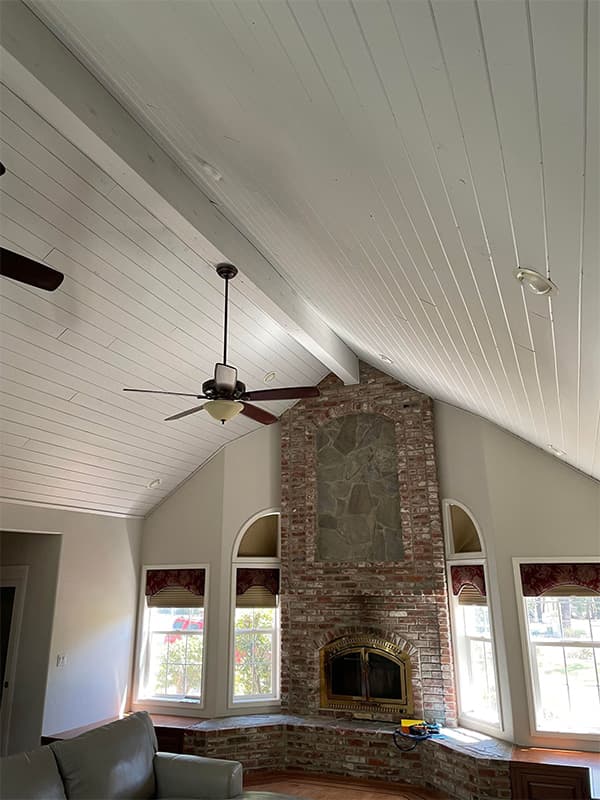 Close-up view of freshly painted siding and under-roof trim on a residential home in El Dorado Hills, CA