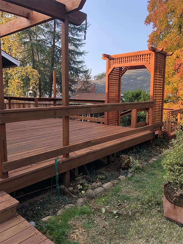 Freshly stained wooden residential deck with natural wood finish in El Dorado Hills, CA